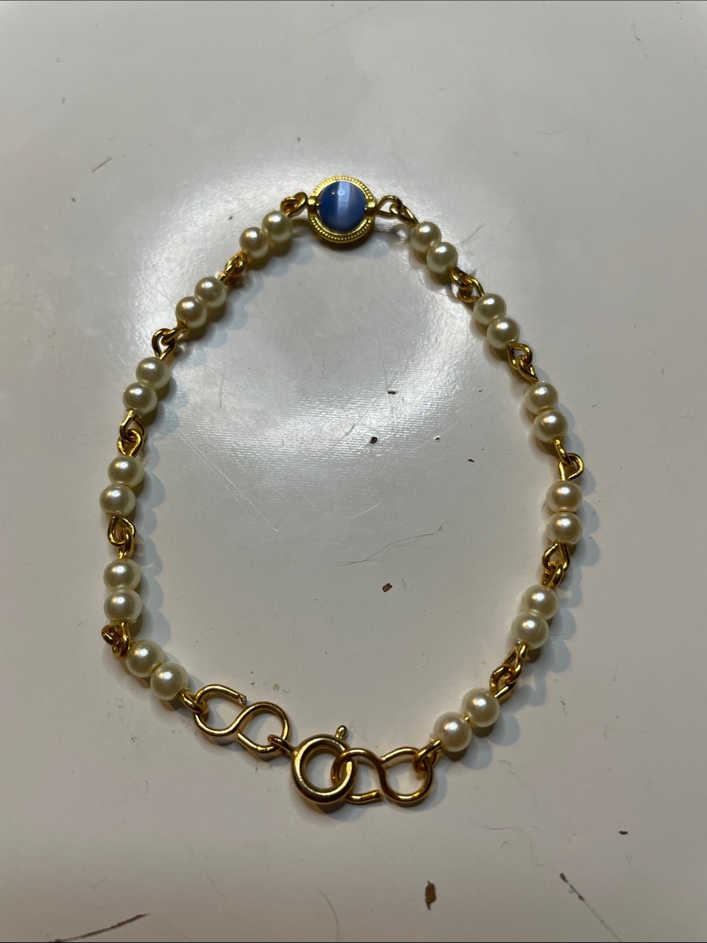Gold Toned Link with Faux Pearl and Blue Cabochon Accent Bracelet